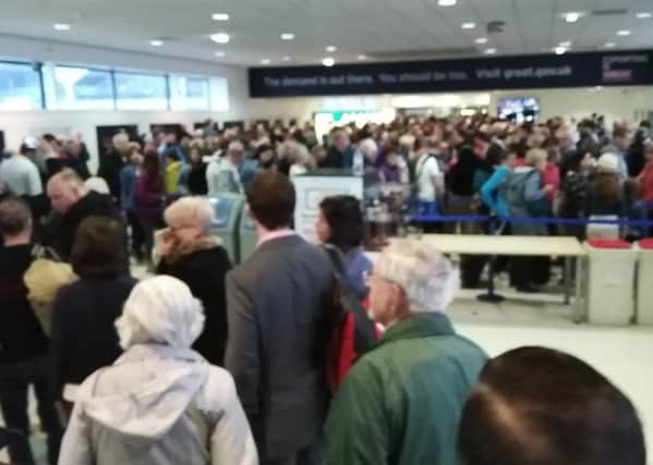 A passenger at Belfast International Airport took this picture on his phone of the long queue for security in May 2018. He wrote:"Chaos before security at #BFS #Aldergrove queues down the  stairs. Some poor school group headed to Holland caught up."  Long delays have been a problem over the summer but as the picture shows, they predate that. Ben Lowry heard of a huge queue in January. Picture taken with his permission from the twitter feed 
@adrianhuston