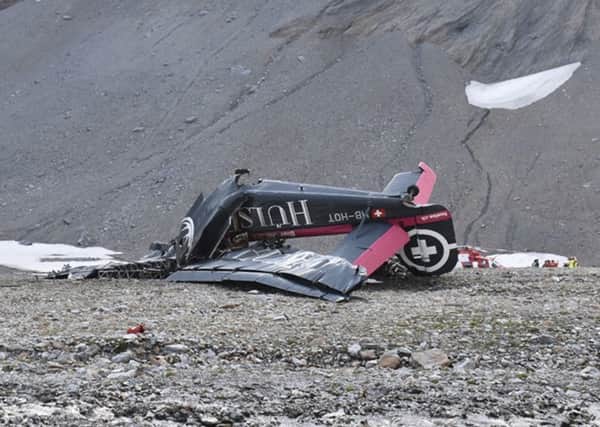 The wreckage of the old-time propeller plane Ju 52  after it went down went down Saturday