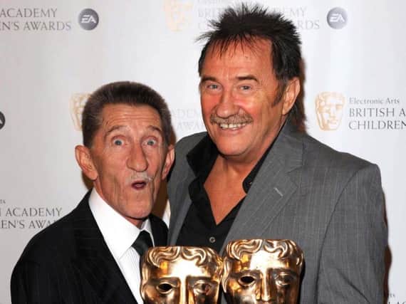 Chuckle Brothers, Barry (left) and Paul Elliott with the Special Award at the EA BAFTA Kids Awards at the Hilton Hotel in London