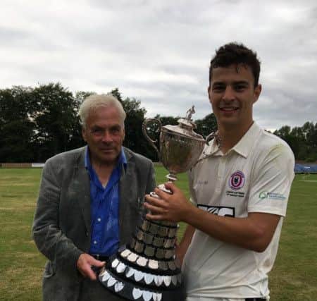Templepatrick CC president Arthur Bowron and First XI captain Ross Bryans with the Junior Cup. PICTURE: Duncan Elder