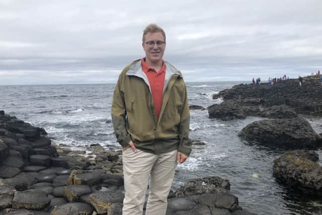 Drew Liquerman, chairman of Republicans Overseas Scotland, at the Giant's Causeway during his day trip to Northern Ireland