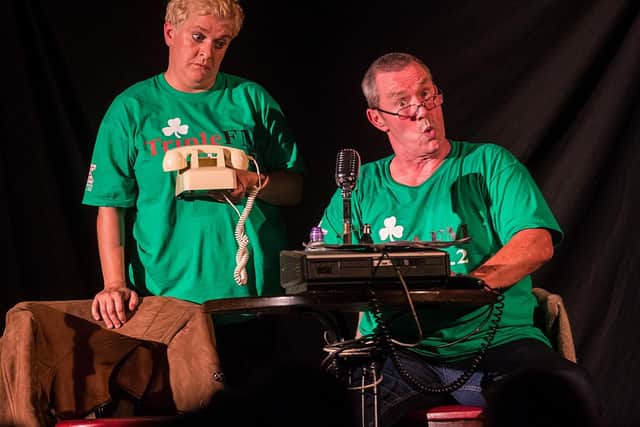 Actors Jo Donnelly (left) and Martin Maguire (right) after a performance at the Roddy McCorley social club of Tony Devlin's play, "A Station Once Again", remembering the west Belfast radio station, "Triple FM", during 30th year of Feile an Phobail (The Community's Festival) in Belfast