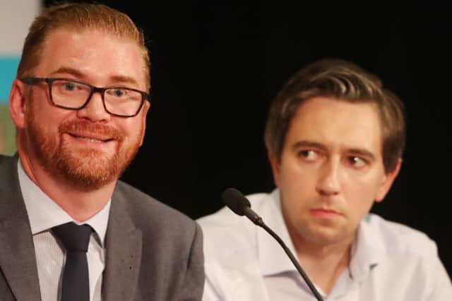 Simon Hamilton of the DUP and Irish Health Minister Simon Harris (right) at the Feile an Phobail leaders debate at St Mary's teacher training college in Belfast. Pic by Niall Carson/PA Wire