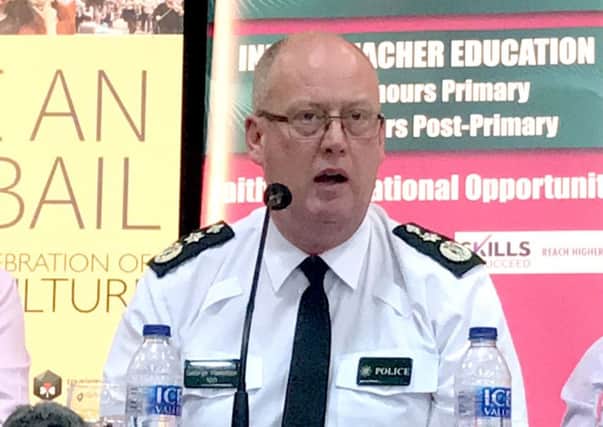 PSNI Chief Constable George Hamilton speaking at the Stuck In the Past event at the West Belfast festival at St Mary's University College in west Belfast.