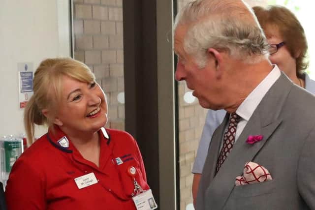 The Prince of Wales meeting Sister Joann McCullagh, a nurse who treated victims of the Omagh bombing at the Tyrone County Hospital in 1998, as she has recalled that day as the "darkest" of her life.