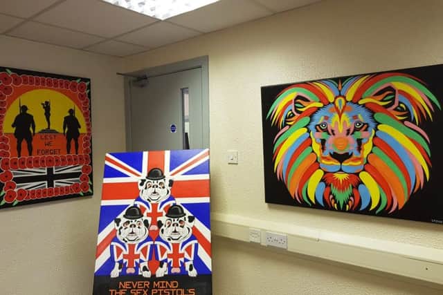 Some of the artwork at the exhibition by Michael Stone