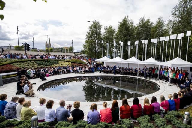 Family and relatives gather at the inter-denominational service at the Memorial Gardens in Omagh to remember the Omagh bombing 20 years on. Photo: Liam McBurney/PA Wire