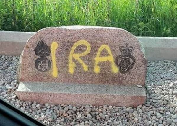 Three Scottish soldiers roadside memorial daubed with graffiti