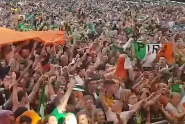 A screen grab from the video showing IRA flags being displayed in the crowd at Falls Park on Sunday
