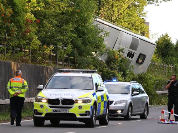 The scene on the the M25 exit slip road at J3, at Swanley on the anti-clockwise carriageway, after a coach overturned