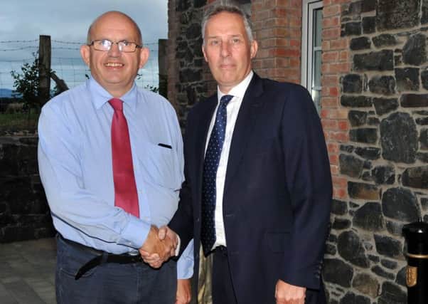 Alderman John Finlay welcomes Ian Paisley to a meeting in North Antrim on Monday evening to show support for the embattled DUP MP. Picture Pacemaker