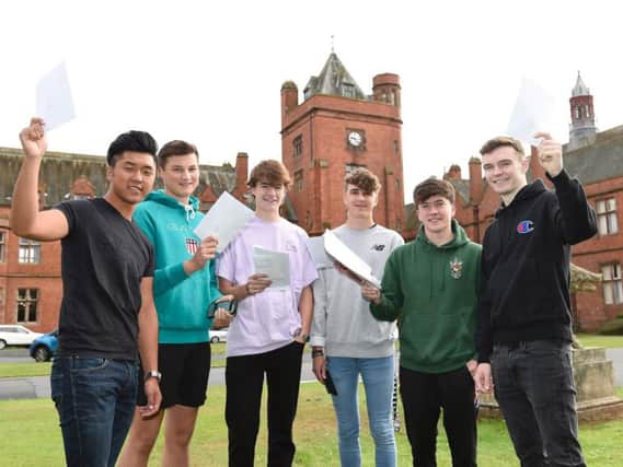 (l-r) Campbell College pupils Andy Dong, Karl Hawthorne, Ross Miley, Dan Stevenson, Robbie Jamison and Callum Jones celebrating their A-level results. Picture: Michael Cooper