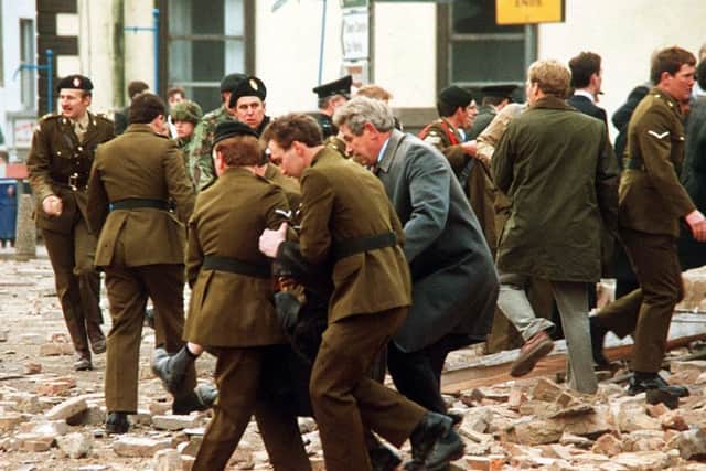 The scene of the Enniskillen bomb seconds after the IRA terrorist bomb blast at a remembrance service in November 1987. Picture by Pacemaker