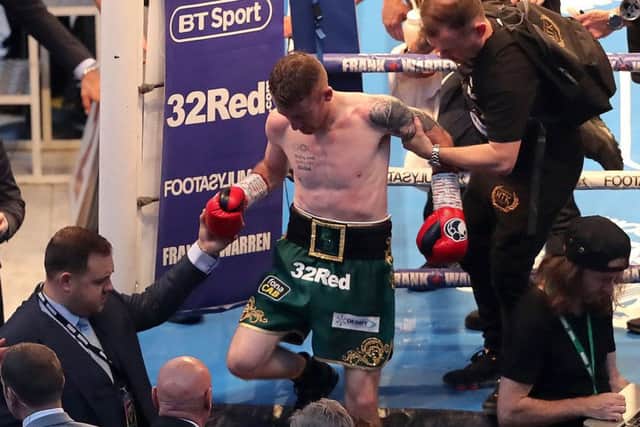Paddy Barnes after being knocked down by Cristofer Rosales during the WBC Flyweight Title fight at Windsor Park, Belfast.  Photo: Niall Carson/PA Wire
