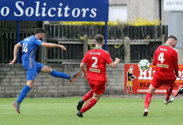 Dungannon's Mark Patton scores a superb opener for  Swifts at Standmore Park. (INPHO/Freddie Parkinson)