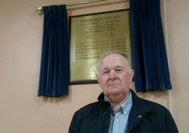 Norman McMullan at the Tullywhisker memorial plaque