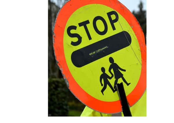 Questions have been raised about the future of school crossing patrols