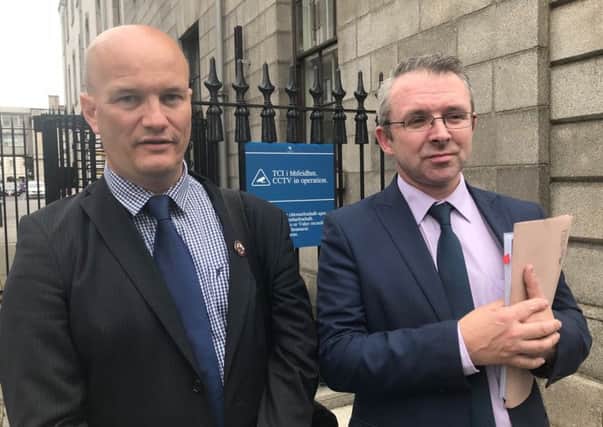 Ciaran MacAirt (left), with his solicitor outside Dublin's High Court, after his legal bid to challenge the appointment of Ireland's new police chief was dismissed. Photo: Aoife Moore/PA Wire