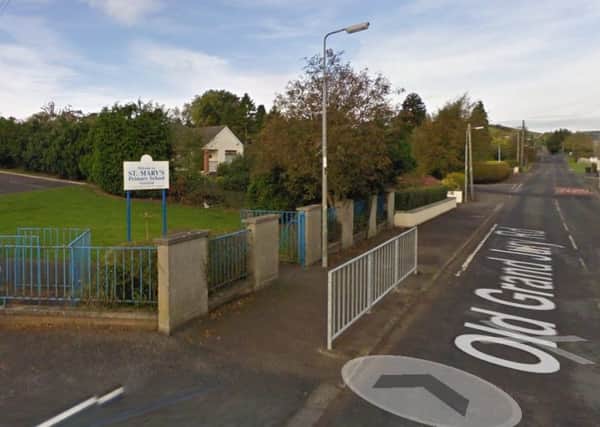 Children going to St Mary's Primary School off the Old Jury Road in Saintfield have to walk through sewerage overflowing into the road, according to local councillors. Photo: Google.
