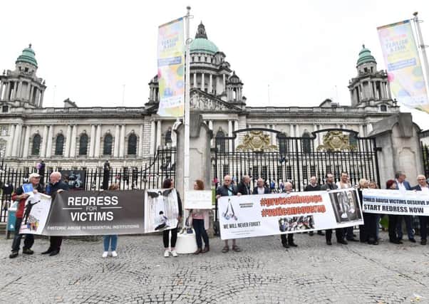 Campaigners against Catholic Church sex abuse outside Belfast City Hall
