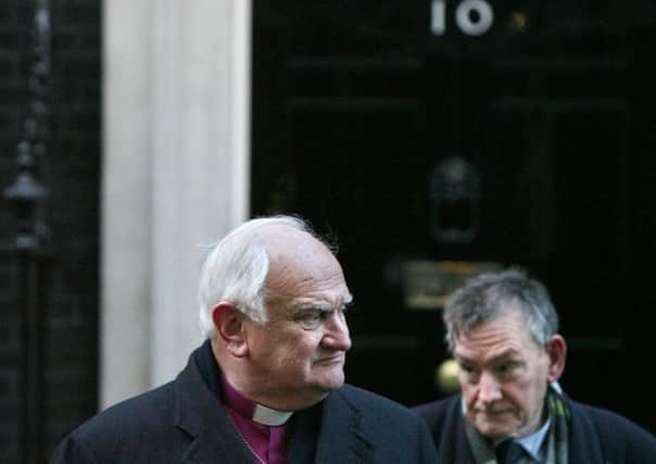 Robin Eames and Denis Bradley, authors of the 2009 report of the Consultative Group on the Past (Eames-Bradley), leaving Downing Street. As was later reported in this newspaper (January1  2017), Lord Eames, a former Church of Ireland Primate, said he was "unhappy with the statutory definition of a victim"