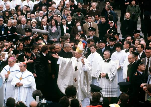 Pope John Paul II walking in procession outside the basilica during his visit to the Knock Shrine in Ireland in September 1979. Photo:: PA Wire