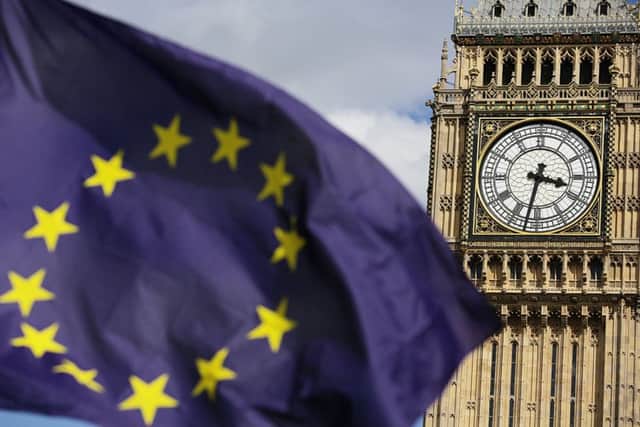A European Union flag in front of Big Ben. Photo credit: Daniel Leal-Olivas/PA Wire