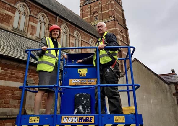 Rev Helene T Steed inspects the roof repairs

Issued on behalf of St Marks Dundela by the Diocese of Down & Dromore.