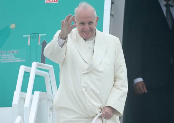 Pope Francis is greeted by a delegation of clergy and representatives from Ireland West Airport as he arrives at the airport in Knock in County Mayo, as part of his visit to Ireland. Photo: Yui Mok/PA Wire