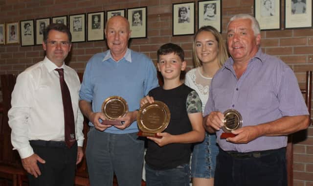Winners of the small herd section,from left: Kevin McOscar, Cookstown, second; Katie and Andrew Browne, Fivemiletown, first; and Kenneth Cartmill, Whitecross, third. Included is judge Matthew Goulding, Tralee, Co Kerry. Picture: Julie Hazelton