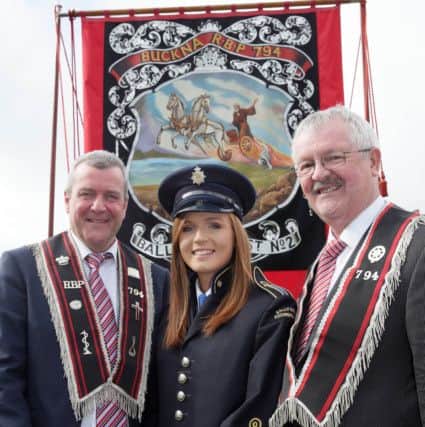 Buckna RBP 794 members Sammy Connor and George Mills with Lauren Connor of Ballygelly Accordion Band at the Co Antrim Grand Black Chapter demonstration in Larne. 
PICTURE BY STEPHEN DAVISON, PACEMAKER