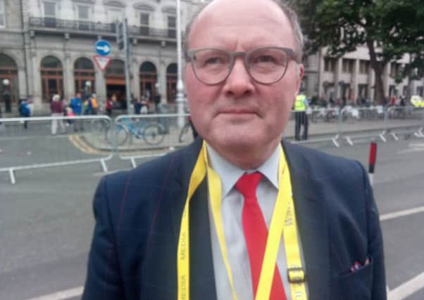 Martin O'Brien, a freelance journalist who contributes to the Irish Catholic and other publications, on Dame St in Dublin just after Pope Francis passed by on Saturday August 25 2018. Picture by Ben Lowry