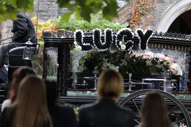 The coffin of 13-year-old Lucy McHugh after her funeral ceremony at Hollybrook cemetery in Shirley, Southampton.