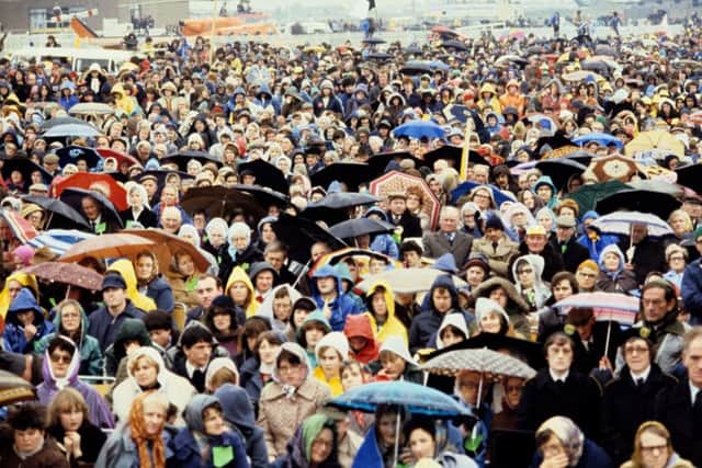 Pope John Paul II was met by huge crowds wherever he appeared in Ireland in 1979. Above, a section of the hundreds of thousands of people who attended a Youth Mass at Galway's Balybrit race course on September 30 of that year. Photo: PA/PA Wire