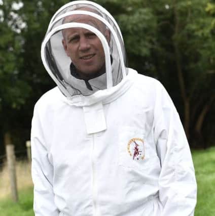 News Letters Graeme Cousins kitted out for beekeeping.
 Pic Colm Lenaghan/Pacemaker