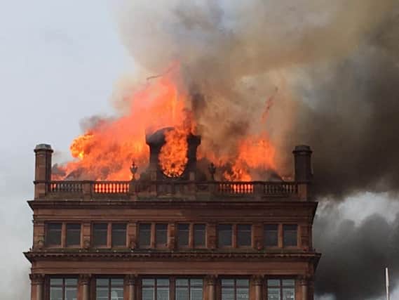 A blaze has torn through a Belfast city centre building