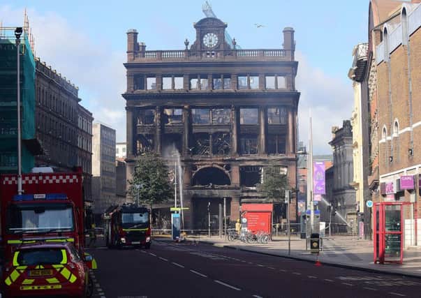 Twenty-four hours after the fire at Primark's Bank Buildings store in Belfast City centre, the city takes stock of how to move forward.
Photo Arthur Allison/Pacemaker Press