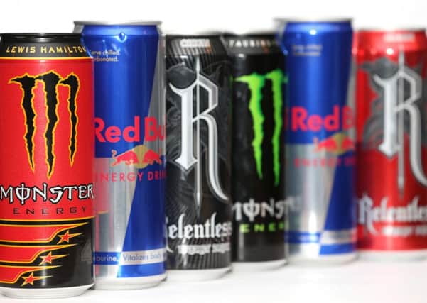 Cans of Red Bull, Monster and Relentless energy drinks. Children in England are to be banned from buying energy drinks under Government plans. Photo: Yui Mok/PA Wire