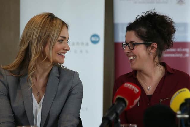 Unmarried mother Siobhan McLaughlin (right) with her solicitor Laura Banks at a press conference at Law Society House, Belfast, following the Supreme Court ruling in her favour