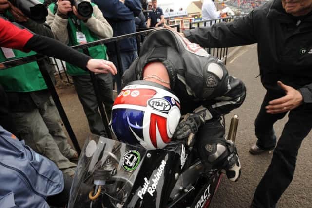 Former British championship racer winner Paul Robinson was overcome with emotion after winning the last ever 125cc race at the North West 200 in 2010.
