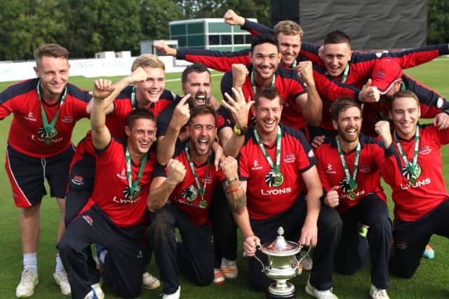 Waringstown celebrate their Irish Cup win over Merrion