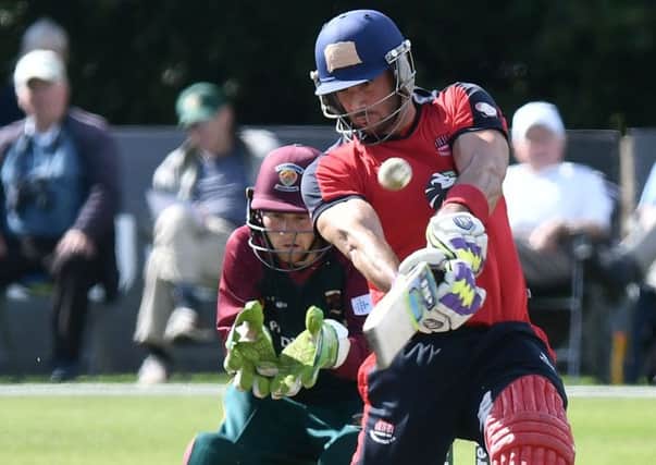 Shaheen Khan on his way to a brilliant unbeaten half-century in Waringstown's Irish Senior Cup final win over Merrion. Picture: Pacemaker
