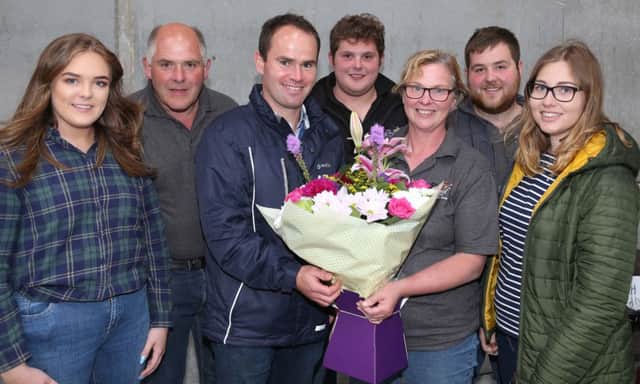 The McLean family's Priestland Herd in Bushmills was the venue for Holstein NI's recent stockjudging event. Iain, Joyce, John, Matthew, Ellie, and April Baldock, are pictured with Holstein NI chairman Jason Booth. Picture: Kevin McAuley Photography Multimedia