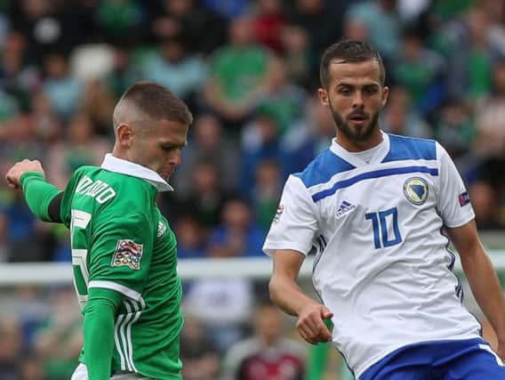 Oliver Norwood in action against Bosnia