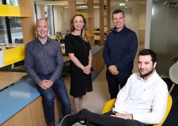 Vicky Davies of Danske Bank and Steve Orr from Connect at Catalyst Inc, centre, with Conor Houston and Conor Logue from Finmondo the first members of the new Catalyst Belfast Fintech Hub