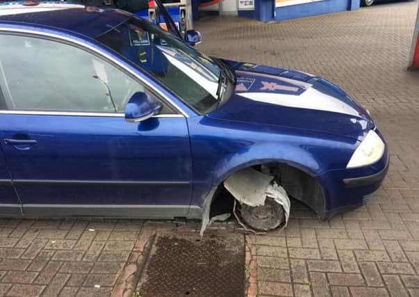 Car, which had only three wheels, was seized by PSNI