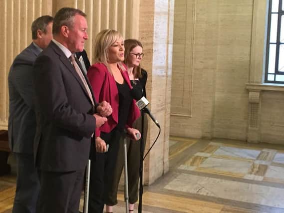 Sinn Fein vice president Michelle O'Neill, Conor Murphy and other Assembly members speak to the media after meeting the Northern Ireland Secretary at Stormont in Belfast