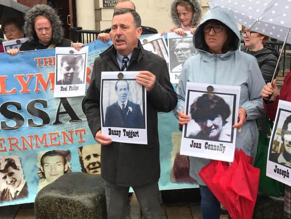 Families of those killed in the Ballymurphy massacre outside the Royal Courts of Justice, Belfast ahead of a preliminary hearing for the inquest into their deaths