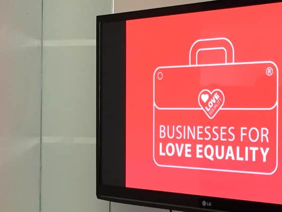 A logo on a screen at the same-sex marriage campaign event in Belfast.