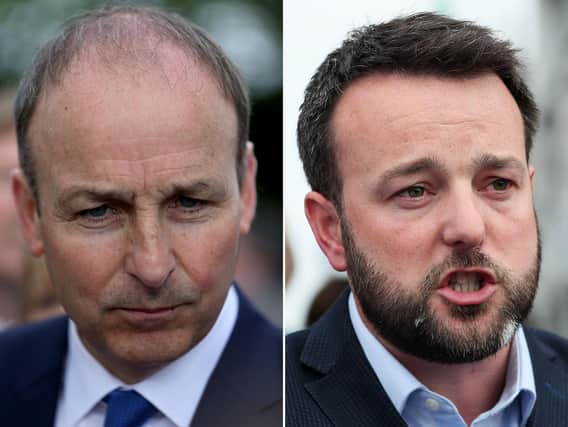 File photos of Fianna Fail leader Micheal Martin (left) and SDLP leader Colum Eastwood. Mr Martin has said talks of a Fianna Fail merger with the Social Democratic and Labour Party (SDLP) to contest elections in Northern Ireland are a work in progress.